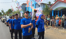 Kirab Obor Porprov IX Jatim Tiba di Malang, Warga Sambut dengan Sukacita dan Tradisi Budaya
