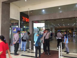 Brimob Polda Maluku Ingatkan Warga Patuhi Protokol Kesehatan
