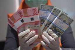 Investor Was-was Dampak COVID-19, Pasar Uang Melemah