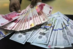 Rupiah Menguat 54 Poin