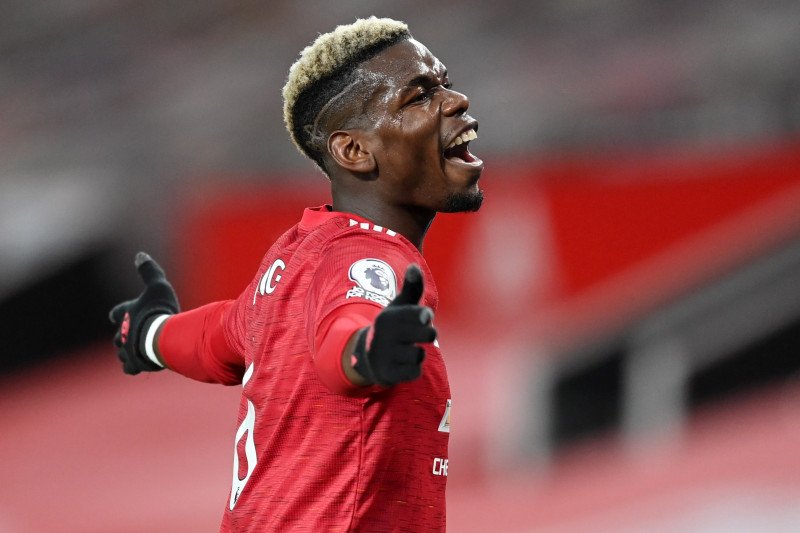 Gelandang Manchester United Paul Pogba saat menghadapi Manchester City di Old Trafford, Manchester, Inggris, 12 Desember 2020. (Pool via REUTERS/MICHAEL REGAN)

