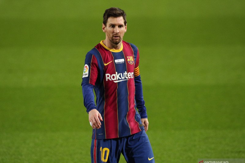 Penyerang Barcelona asal Argentina Lionel Messi saat bermain melawan Valencia di Camp Nou, Barcelona, Spanyol pada 19 Desember 2020.(REUTERS/ALBERT GEA)

