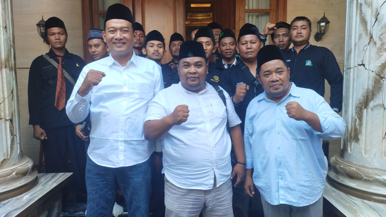 Caption Foto - Ketua Aliansi Santri Nusantara, H Mohaimin (tengah).