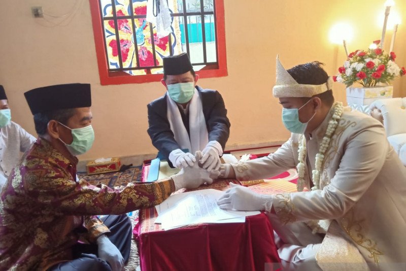 Akad nikah yang dilangsungkan di tengah masa pandemi Covid-19 | KEMENAG