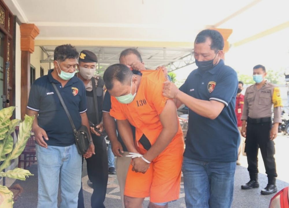 Pelaku pencuri di Minimart digiring petugas kepolisian (Foto: HMP/ide)