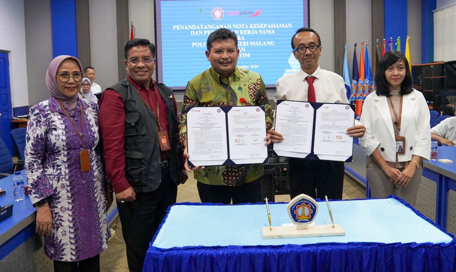 bankjatim  melakukan penandatanganan nota kesepahaman atau Memorandum of Understanding (MoU) dengan Politeknik Negeri Malang (Polinema) pada hari Senin (30/12). 