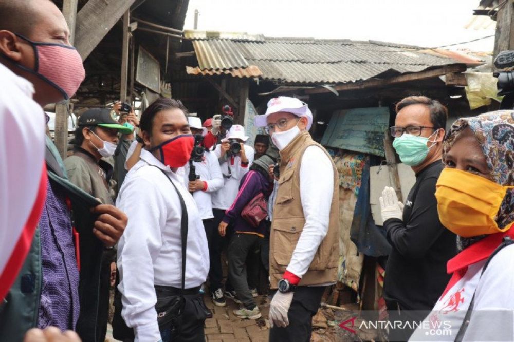 Cairkan suhu politik, relawan Jokowi dan Sandiaga bersatu lawan COVID-19 (Istimewa)