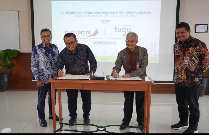  Bankjatimmelaksanakan penandatanganan nota kesepahaman dengan PT Asuransi Tugu Pratama Indonesia Tbk (Tugu Insurance) pada hari Jumat (14/6).