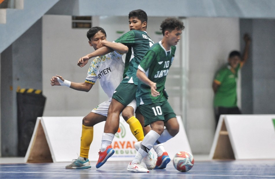 Tim Futsal Putra Jatim memastikan langkah mereka ke babak final Cabor Futsal PON XXI Aceh-Sumut 2024 setelah meraih kemenangan dramatis 3-2 atas Banten 