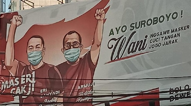 Baliho Eri Cahyadi dan Armuji di Kota Surabaya