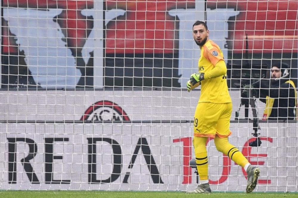 Penjaga gawang AC Milan Gianluigi Donnarumma. (AFP/MARCO BERTORELLO)