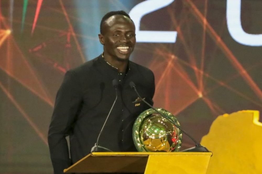 MAKLUM: Pemain sayap Senegal dan Liverpool, Sadio Mane saat memenangkan anugerah Player of the Year Piala Afrika 2019 di Mesir pada 7 Januari 2020.(AFP/KHALED DESOUKI)
