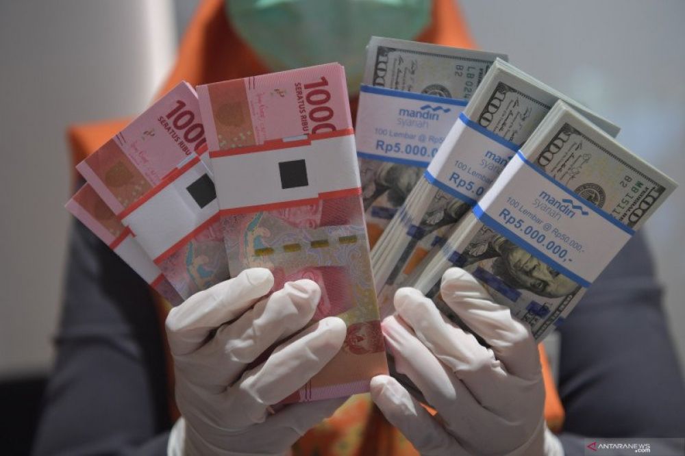 Kurs rupiah terhadap Dolar As bergerak melemah di kisaran Rp 15.450 pada perdagangan Jumat (24/4) ini. (Foto HMP/ANT)