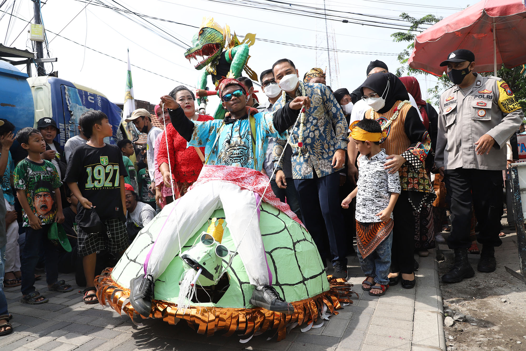 Acara sedekah Bumi di Kampung Gadel, Kelurahan Karangpoh, Kecamatan Tandes, Surabaya, Minggu (4/9/2022).